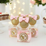Elegant handmade Minnie Mouse party favor boxes with gold glitter ears, pink bows, and keepsake sweets kids party decorations— Party By Imagination