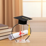 Graduation party set with cap centerpiece and coordinated decorations for celebration