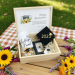 Personalized graduation wooden gift box with keepsake items, piggy bank, candle and graduation keychain