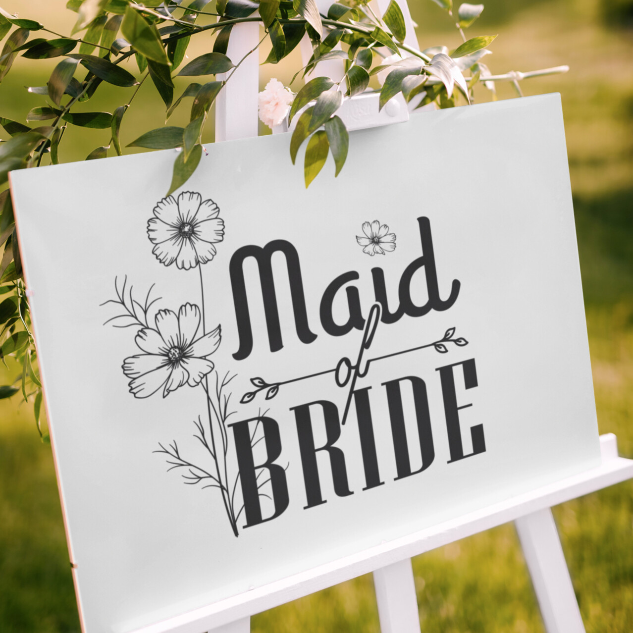Maid of Bride wedding sign printable PNG design displayed on outdoor bridal party welcome board