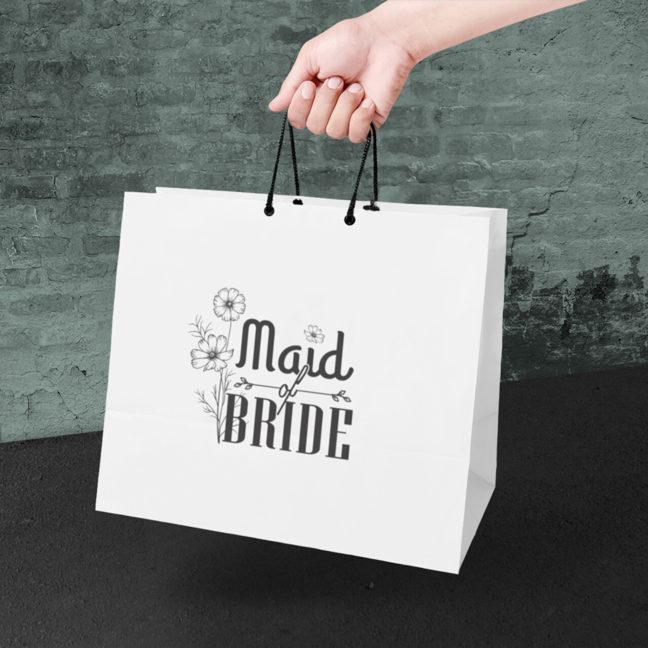 Maid of Bride PNG design printed on bridal party gift bag for wedding shower favors