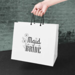 Maid of Bride PNG design printed on bridal party gift bag for wedding shower favors