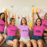 Bridal Hype Squad PNG Set, Bride and bridal party wearing Hype Queen, Lead Hype Woman and Professional Hype Women shirts celebrating at bachelorette party with drinks and bride banner