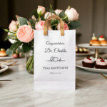 Personalized doctor Match Day gift bag with Congratulations Dr. Chubbs You Matched message and heartbeat medical symbol, white residency match celebration gift bag