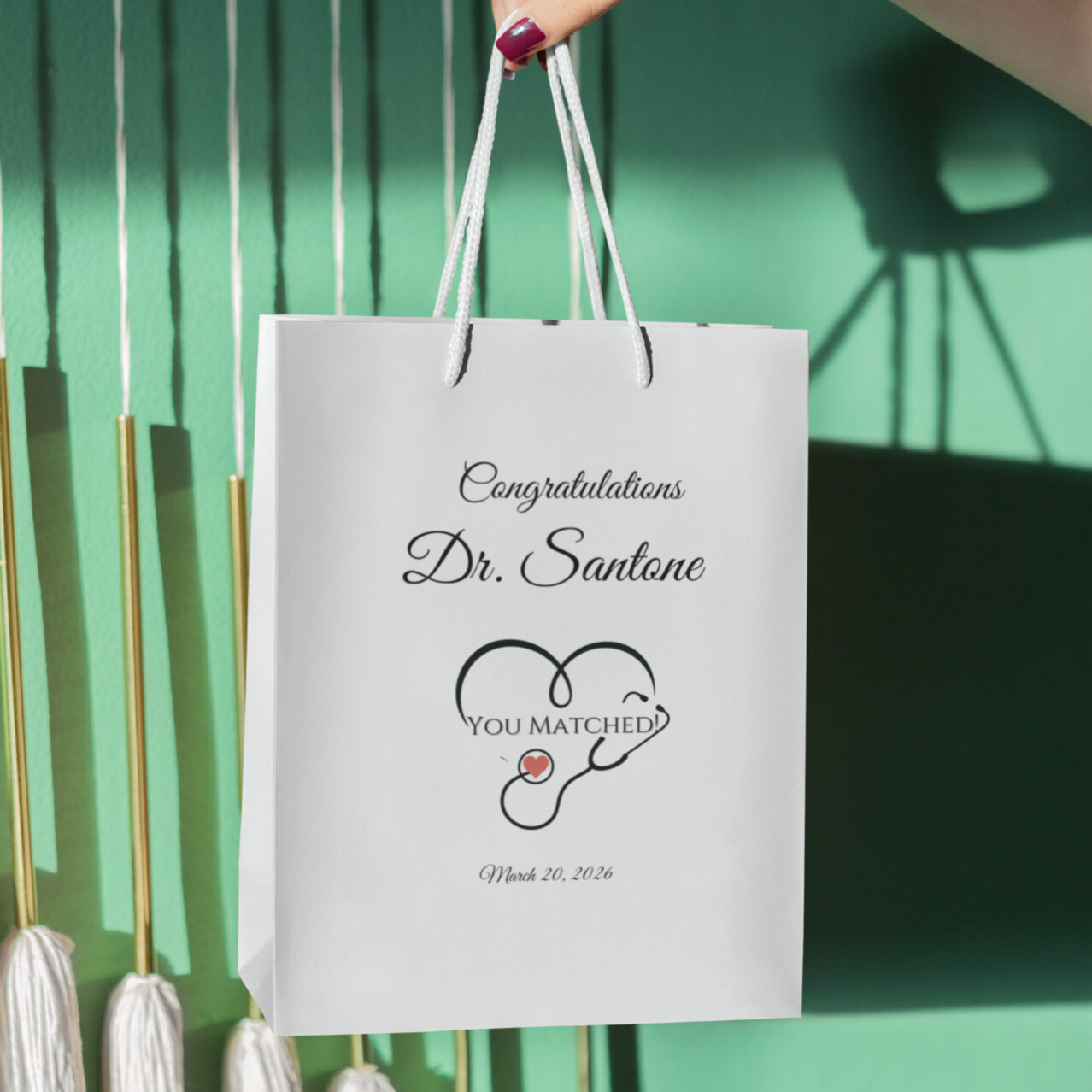 doctor match day gift bag. Personalized medical match day gift bag with stethoscope heart design and custom doctor name for graduation celebration