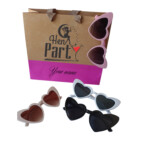 welcome bags with heart sunglasses in pink, blue, and green colors for
