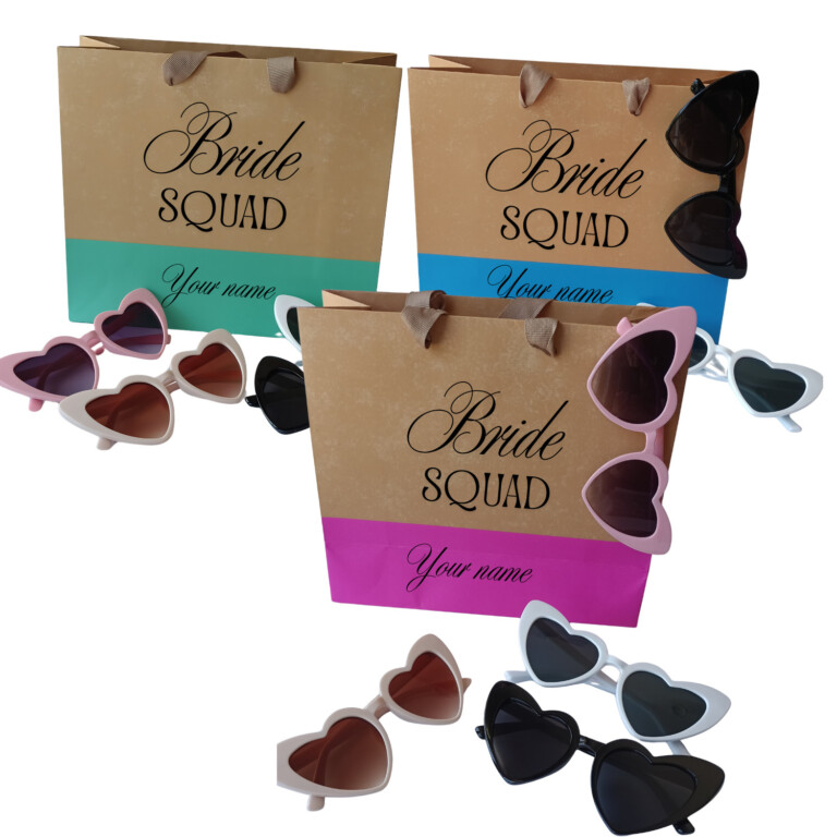 Personalized Bride Squad gift bags with heart sunglasses in pink, blue, and green colors for bridal parties, bridesmaid gifts, and wedding weekend celebrations.